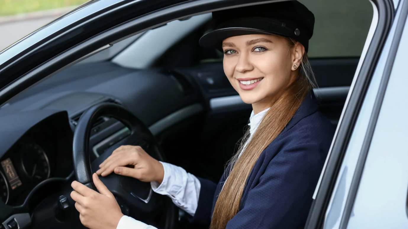 Smiling Chauffeur Girl in Car, RNR Transportation